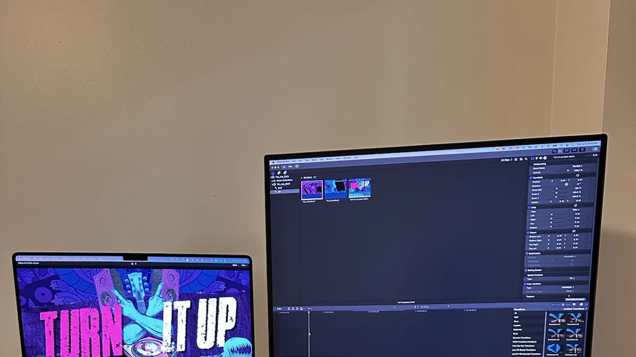 Editing workstation with a laptop and vertical monitor