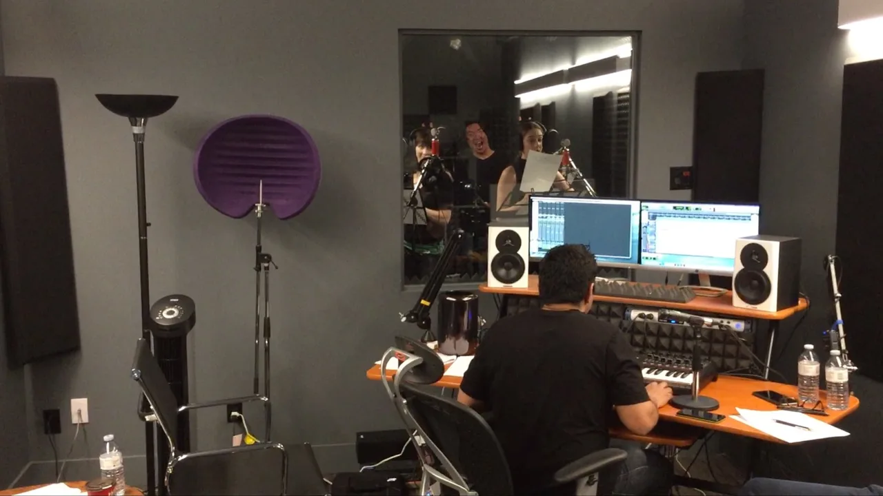 Recording studio session at a mixing console